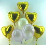Hochzeitsdekoration Goldene Herzen